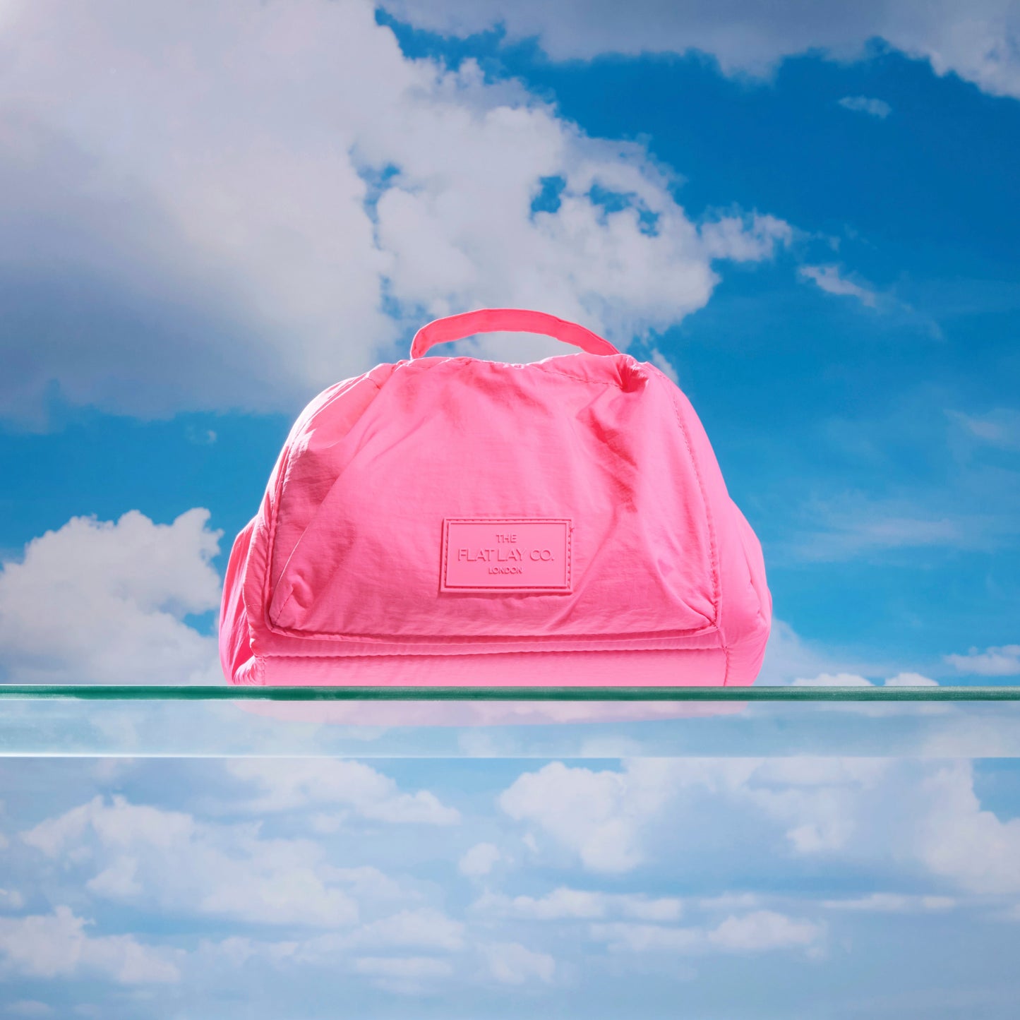 The Flat Lay Co. Drawstring Makeup Bag in Hot Pink Parachute