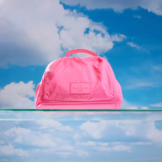 The Flat Lay Co. Drawstring Makeup Bag in Hot Pink Parachute